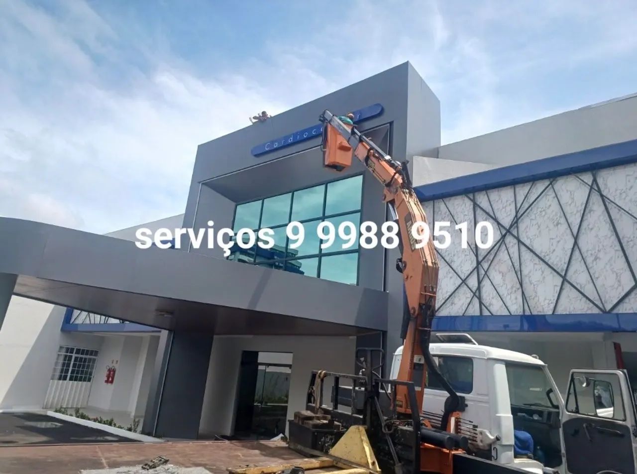 Serviços com caminhão Munck e cesto aéreo 