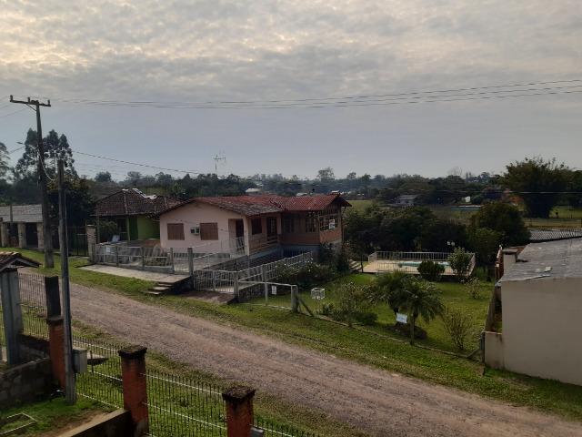 Casa 3 dormitórios no bairro Califórnia em Nova Santa Rita