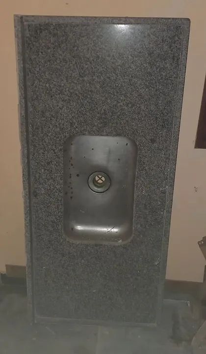 Bancada de granito com pia inox