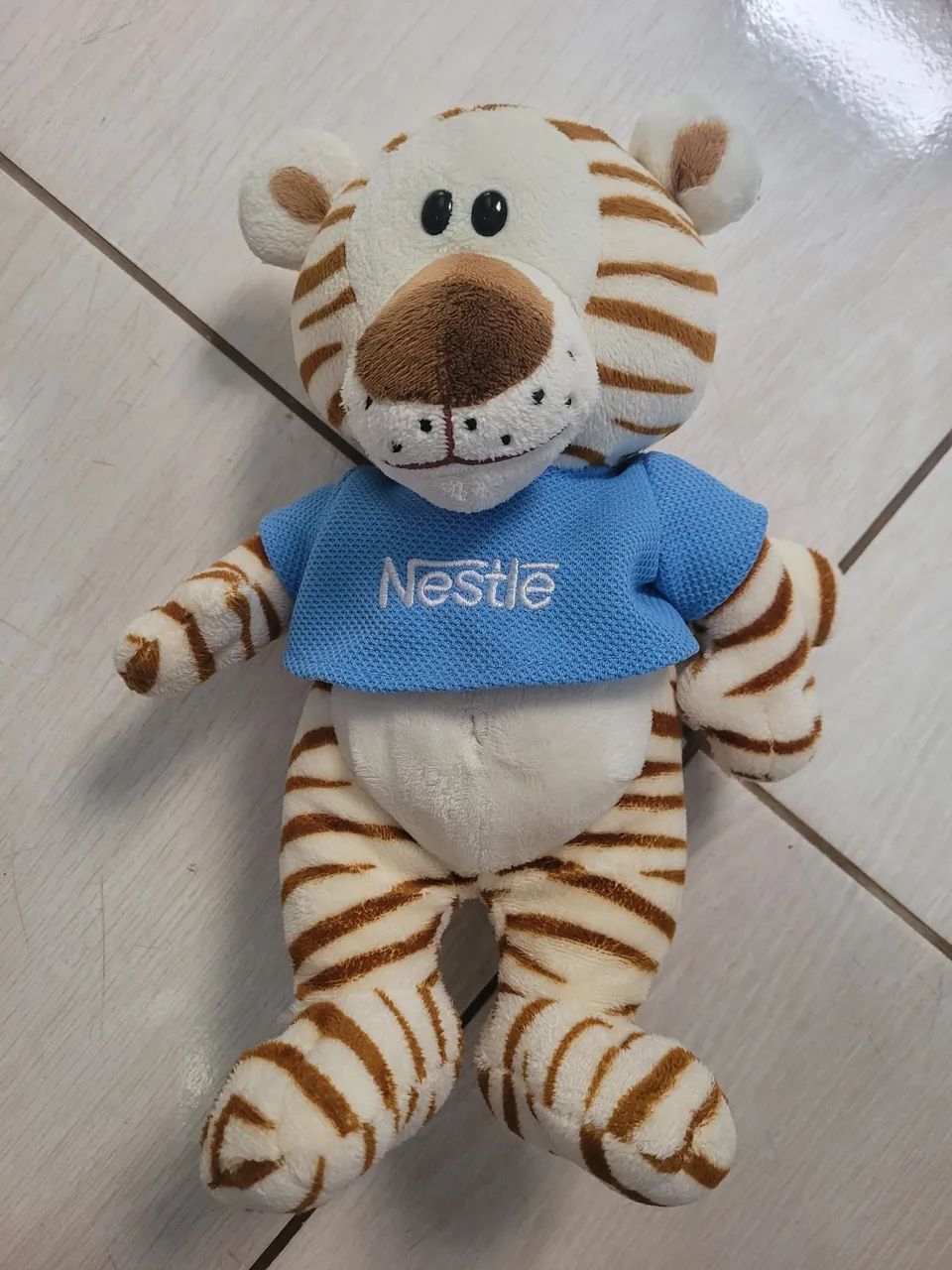 Pelúcia nestle 