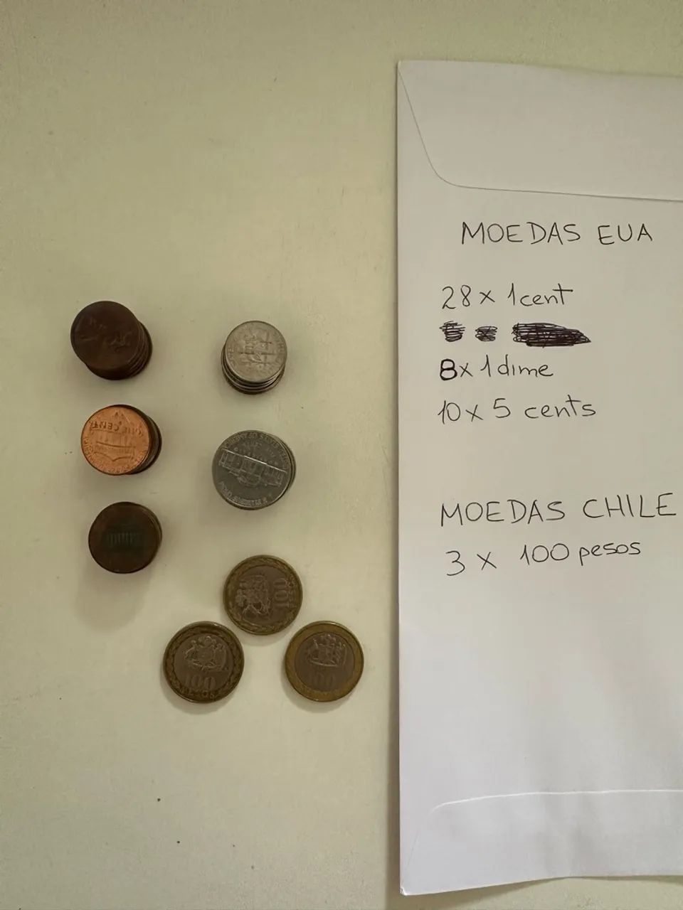 Moedas EUA + 3x100 pesos chilenos 