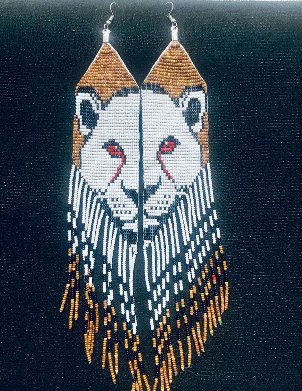 Brinco de mincagas onça. Pintada e albina. 