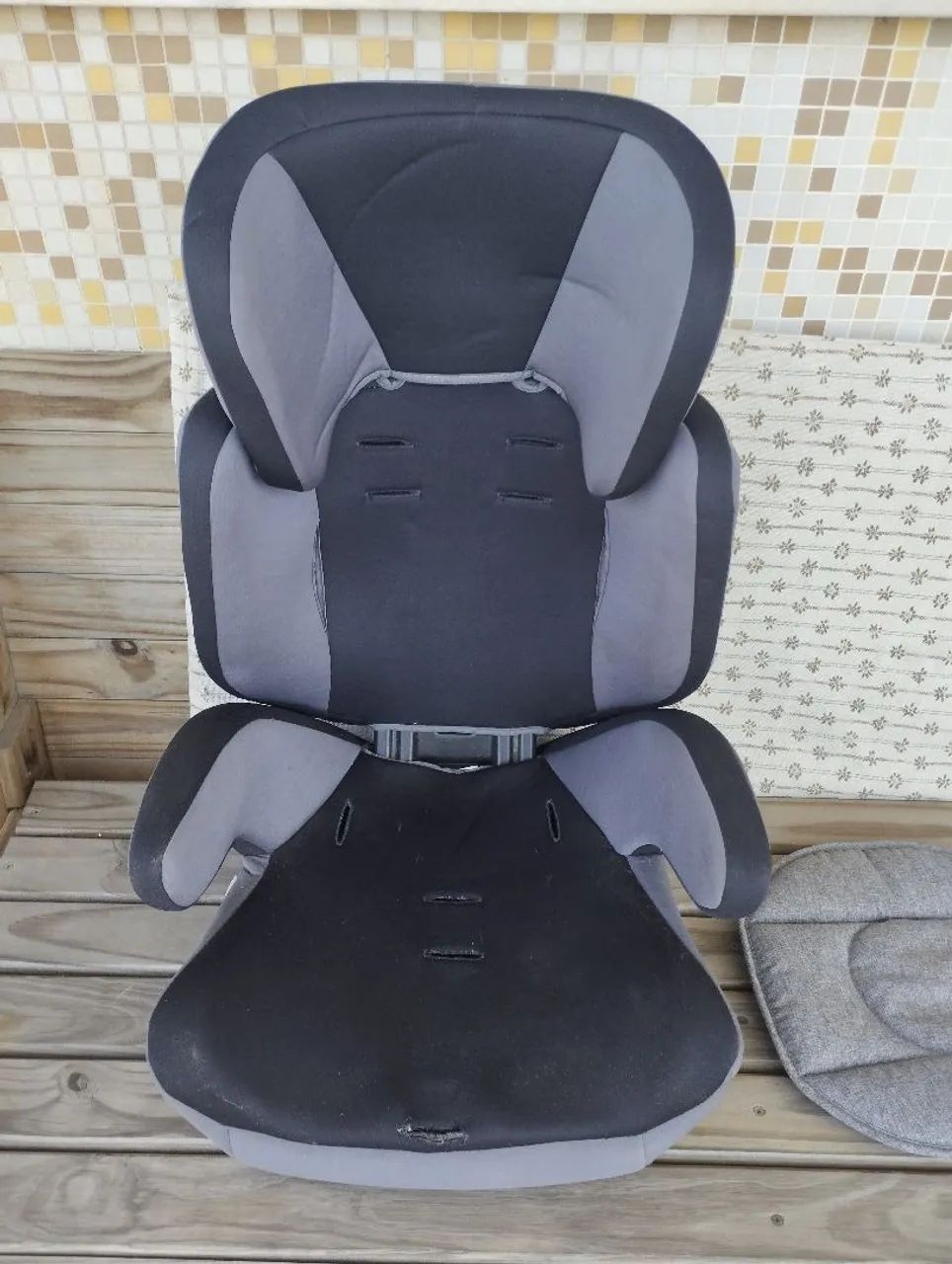 cadeirinha veicular com assento de elevação marca Still