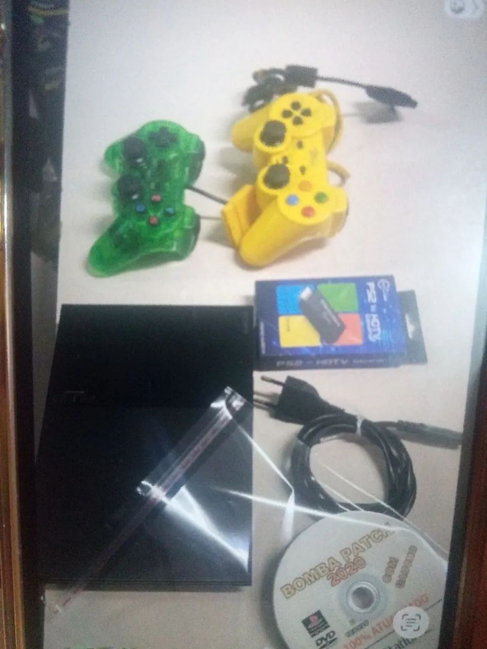 PS2 com leitor funcionando perfeitamente 