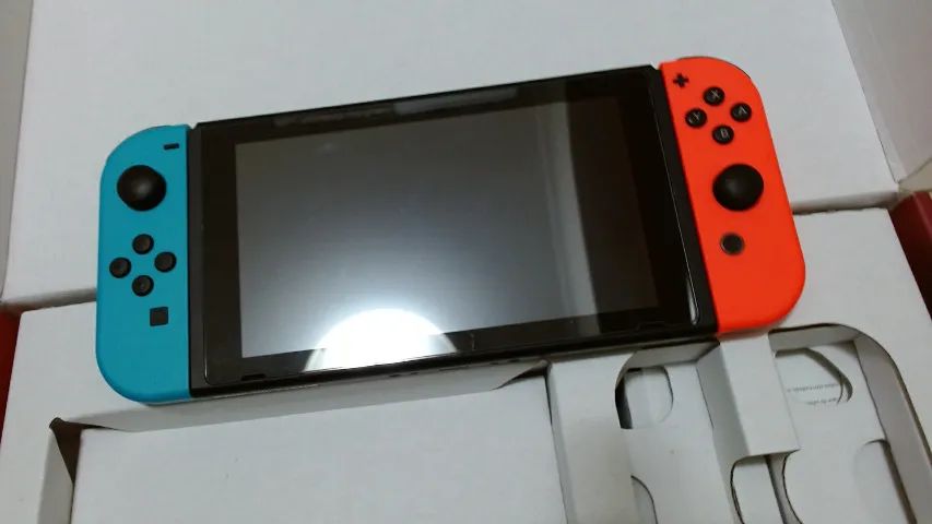 Nintendo Switch Vermelho E Azul Seminovo Com Caixa Original
