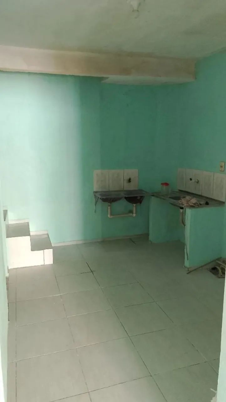 Dúplex dois quartos dois banheiros, área em cima e uma garagem  - Foto 4