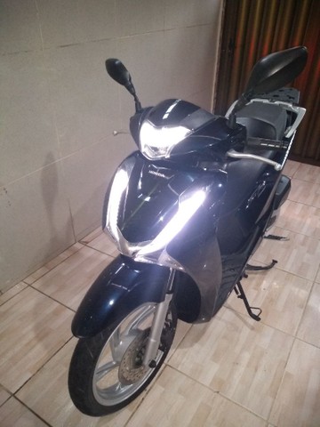 VENDO HONDA SH COM APENAS 6000 KM