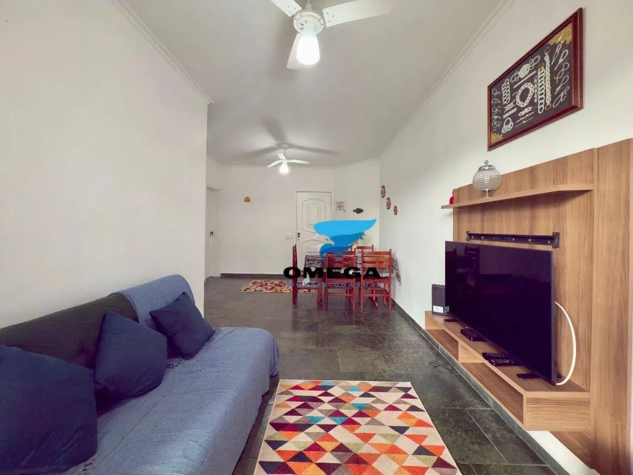 Apartamento à venda na praia do Tombo no Guarujá I Omega Imoveis