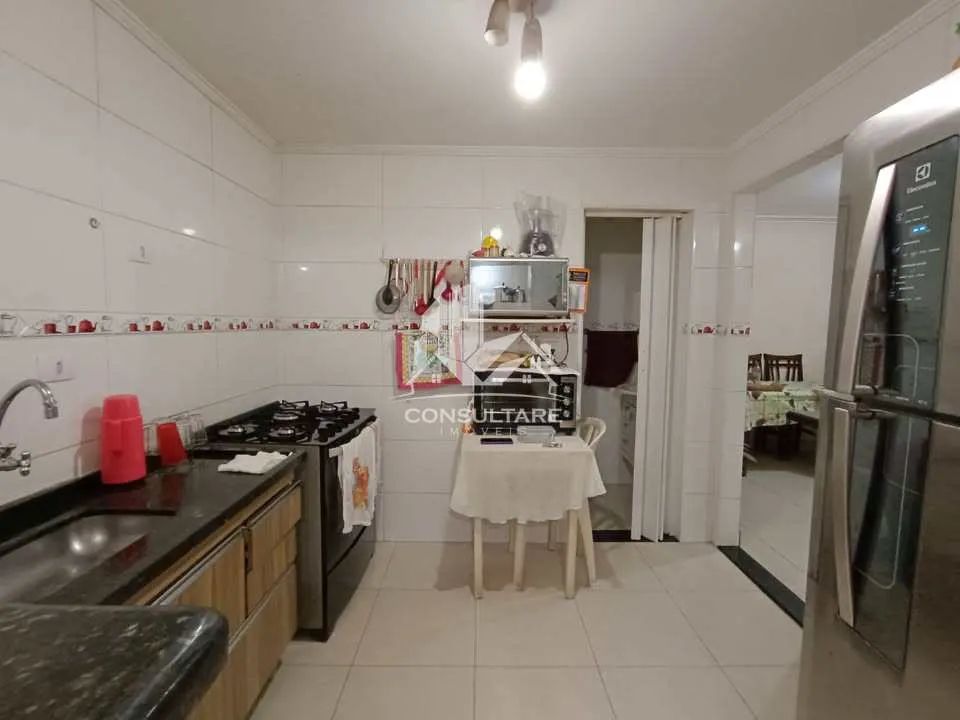 Casa de 2 dormitórios localizada no tradicional bairro do Macuco, em Santos. - Foto 4