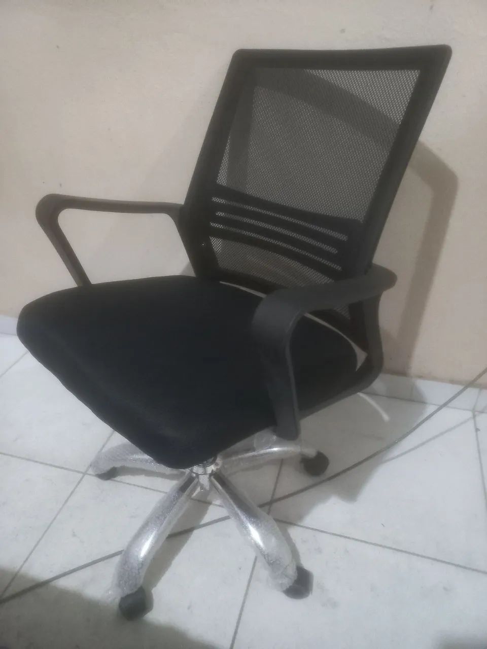 Cadeira  giratória com defeito 
