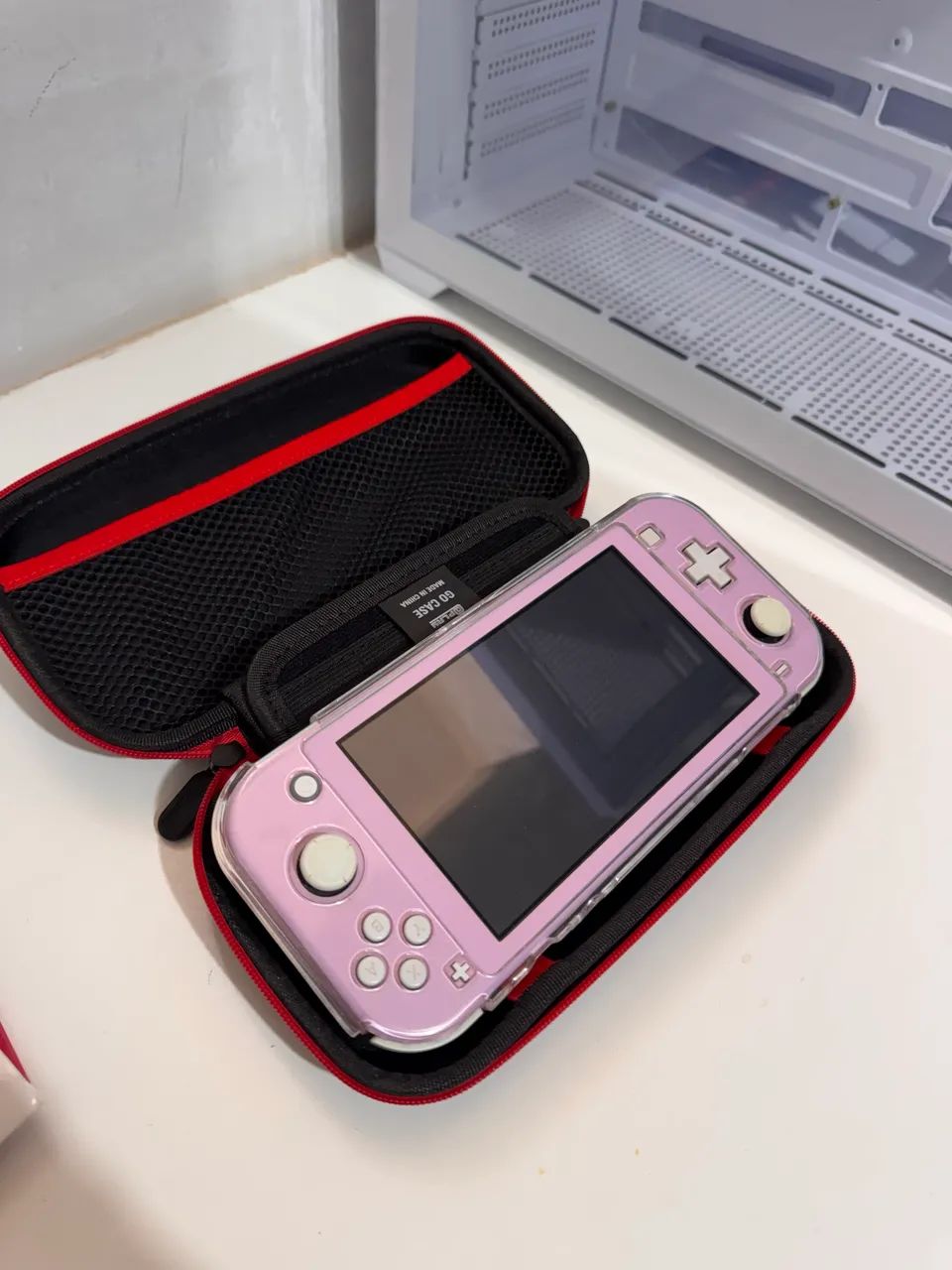Nintendo Switch Lite + case de transporte - Foto 3