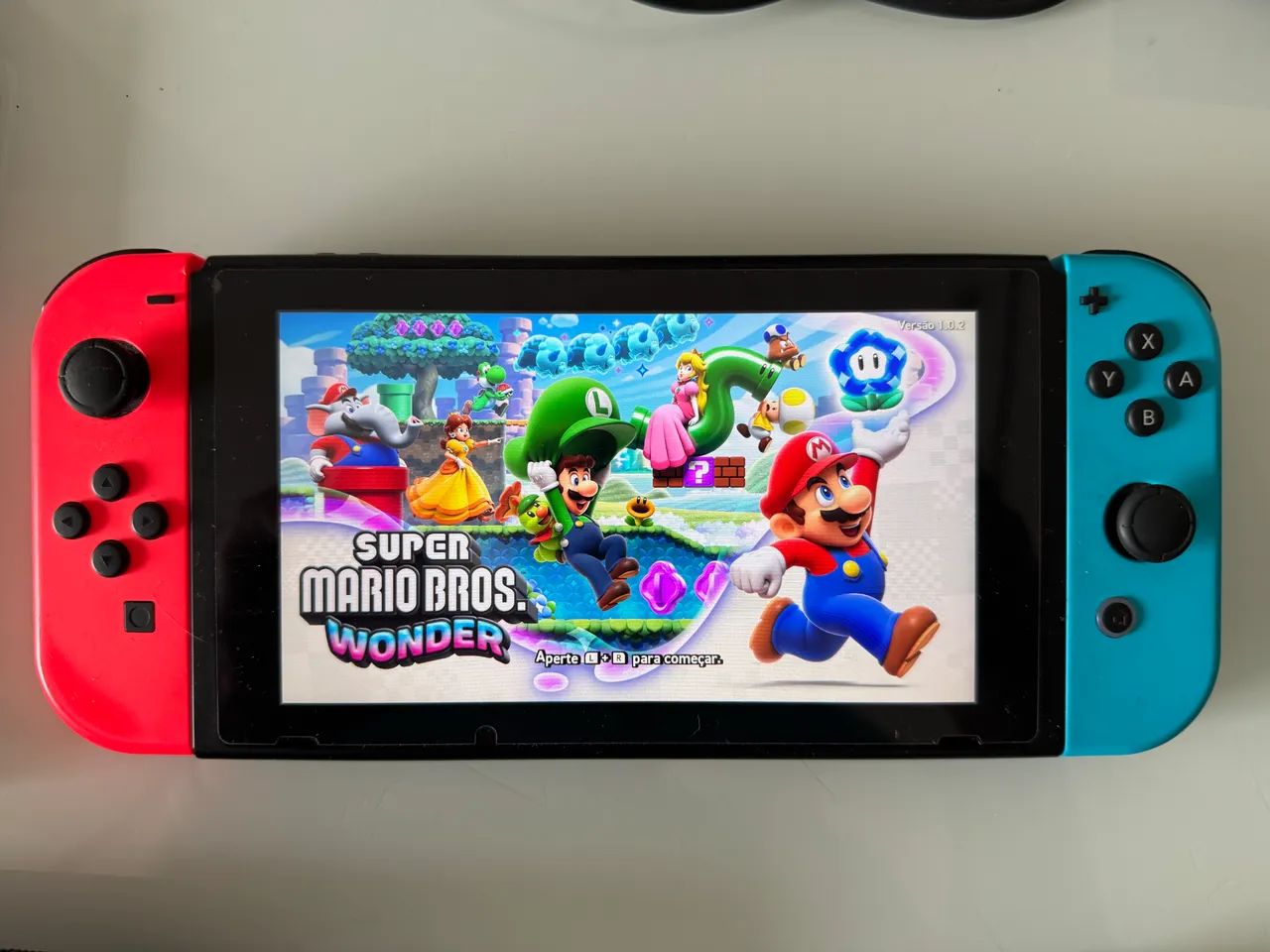 Nintendo Switch V1 + 4 jogos - Foto 3