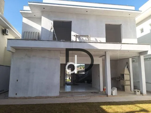 Casa com 3 dormitórios à venda, 210 m² por R$ 1.550.000,00 - Condomínio Portal do Jequitib