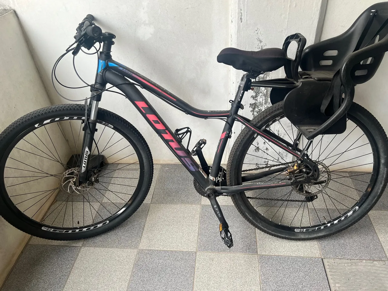 Bicicleta Lotus Angel Aro 29 com Cadeirinha