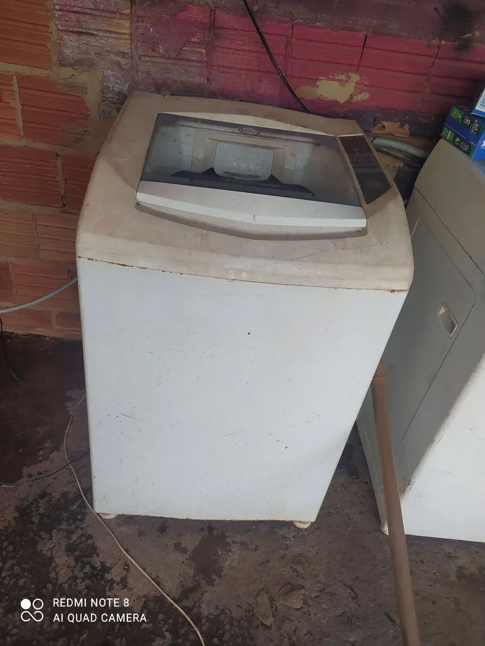 Máquina de lavar com defeito 