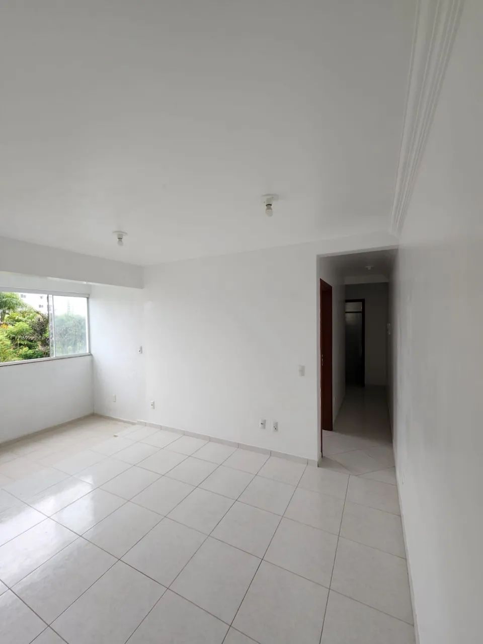 Apartamento na Pedra Branca, 1º andar, com dois quartos, garagem e sacada