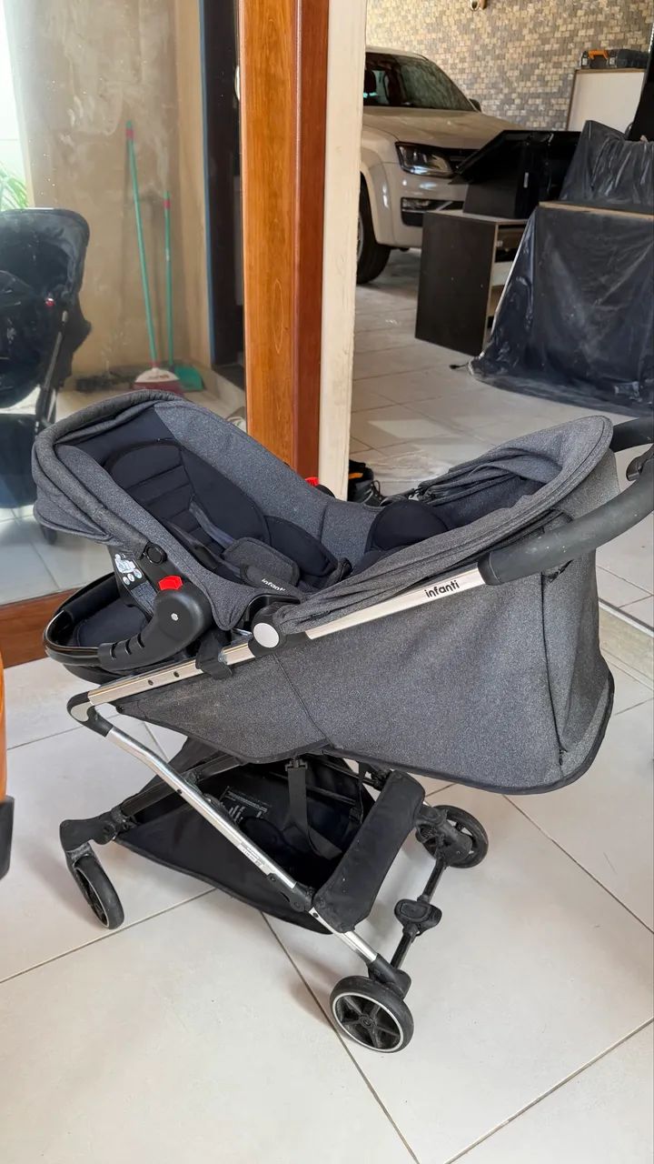 Carrinho de bebê com bebê conforto  - Foto 3