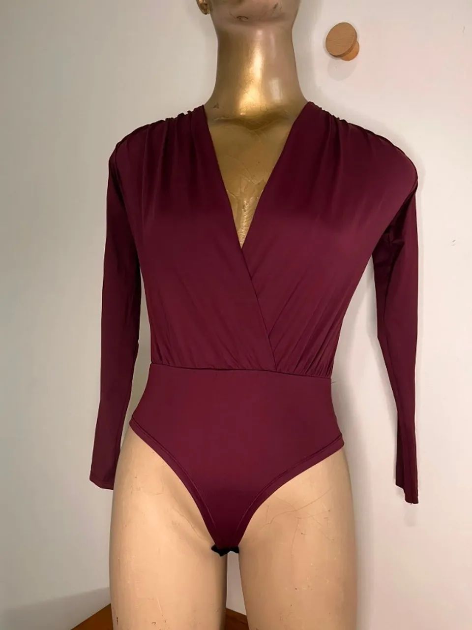 body manga longa decote v