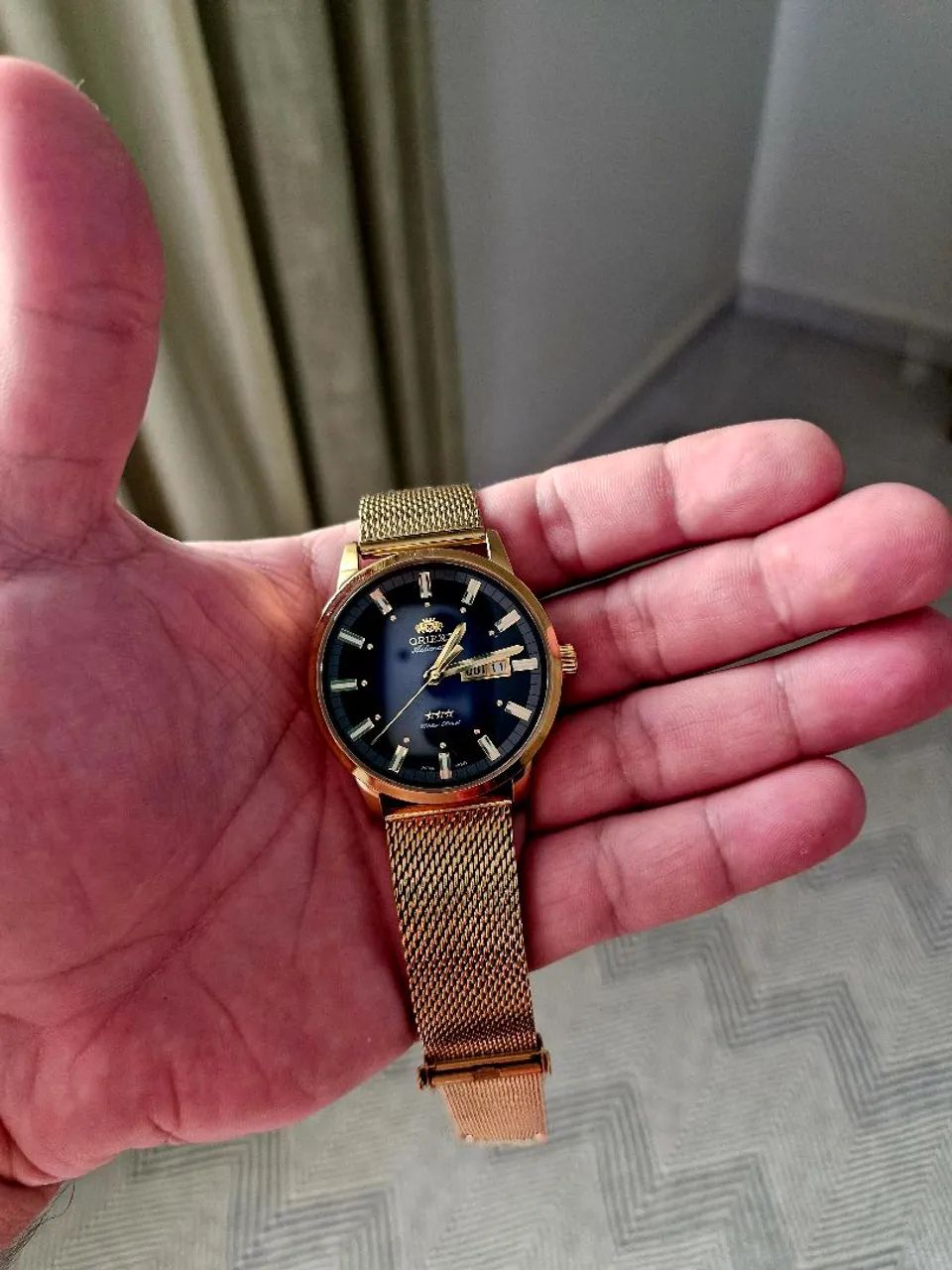 Relógio ORIENT masculino automático dourado 