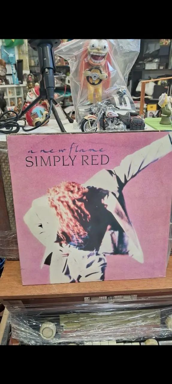 lp simply red - a new flame ótimo estado de conservação 