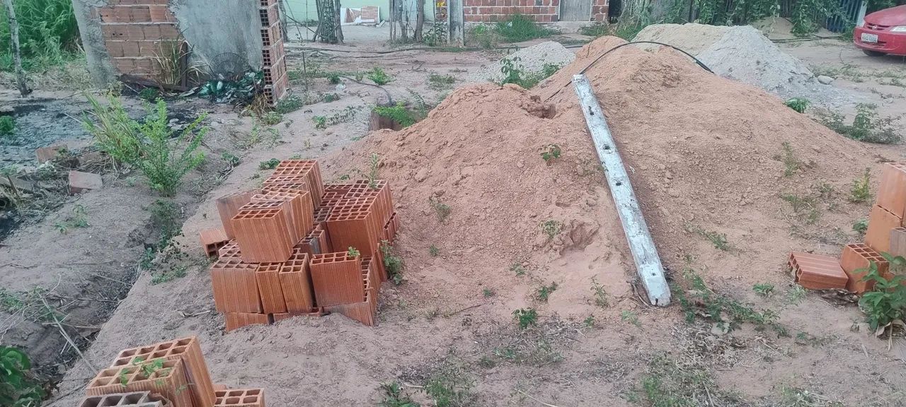 Vendo ou troco terreno com casa 