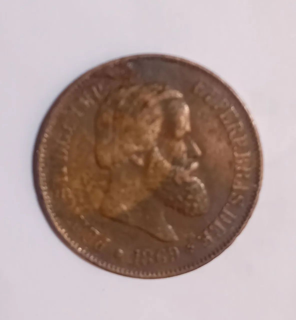 Moeda antiga 20 réis de 1869.