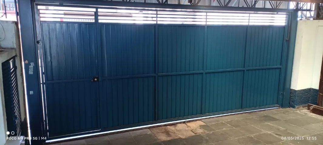 PORTÃO DE AÇO BASCULANTE (ENGRENAGENS EM CORRENTE) EM ÓTIMO ESTADO. - Foto 3