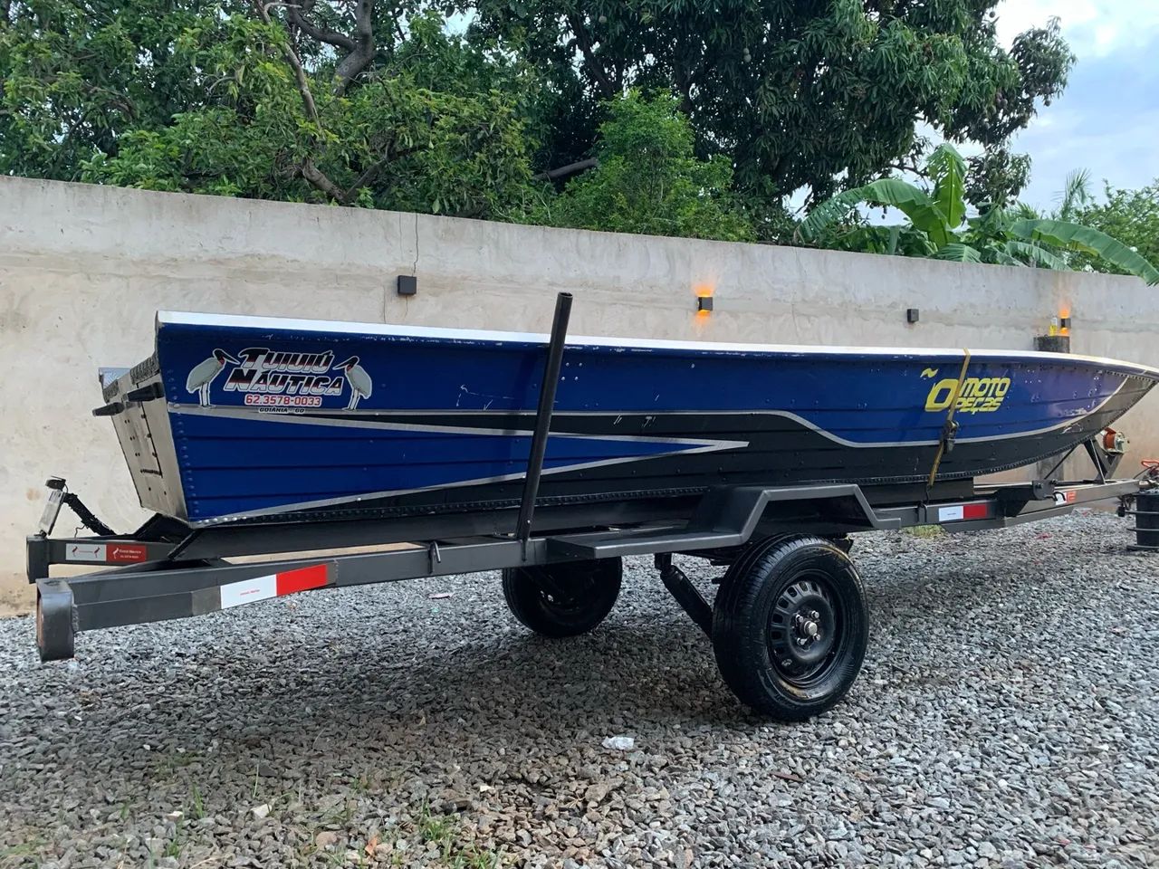 Canoa e motor 18 hp 