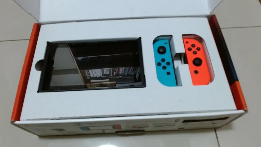 Nintendo Switch Vermelho E Azul Seminovo Com Caixa Original Nintendo Switch Vermelho E Azul Seminovo Com Caixa Original