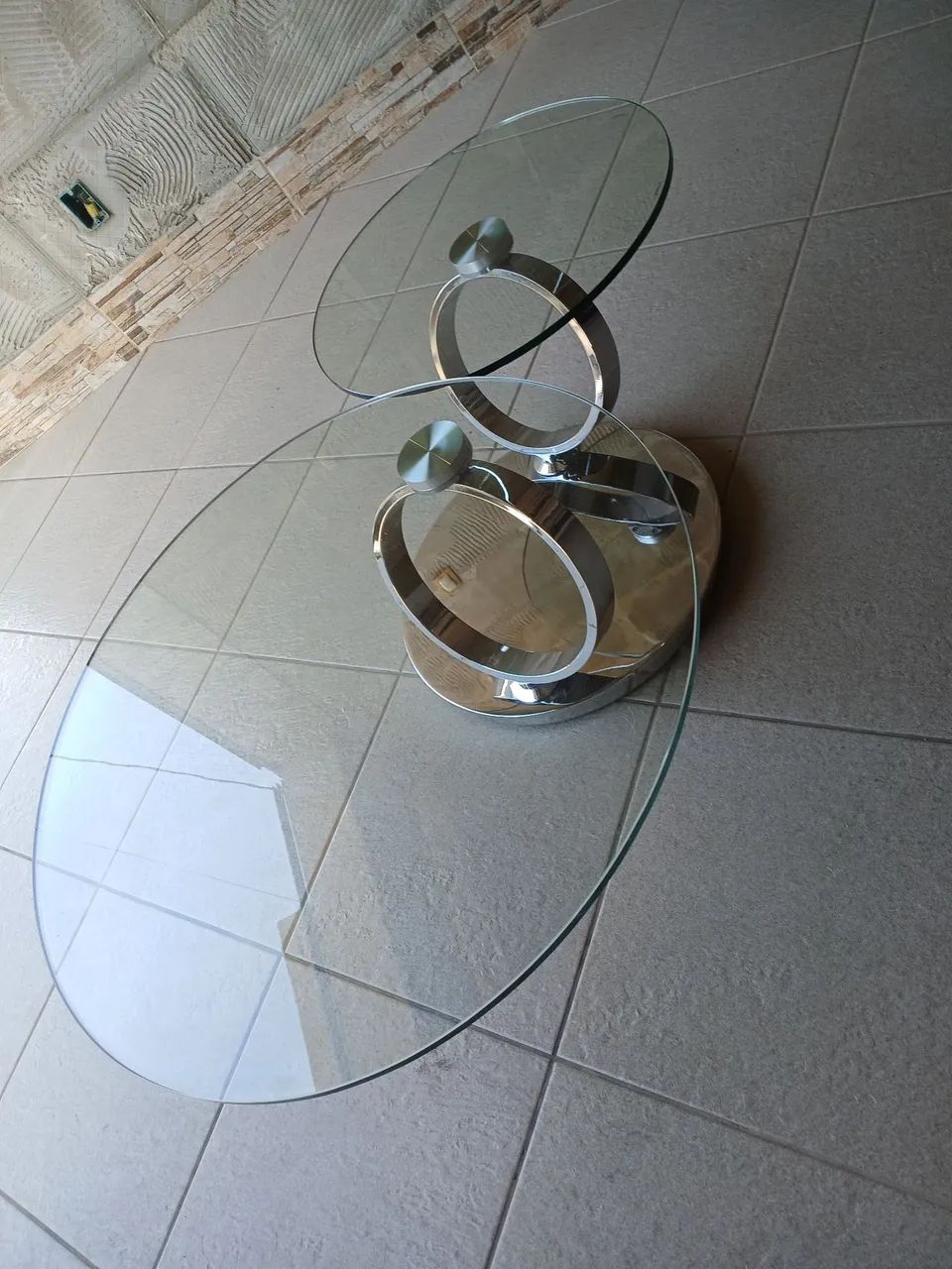 Lindíssima mesa de centro argolas inox giratorias e vidro. - Foto 5