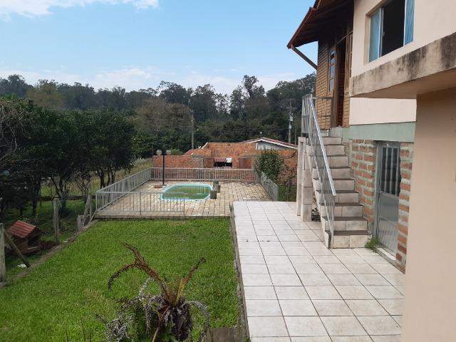 Casa 3 dormitórios no bairro Califórnia em Nova Santa Rita - Foto 9