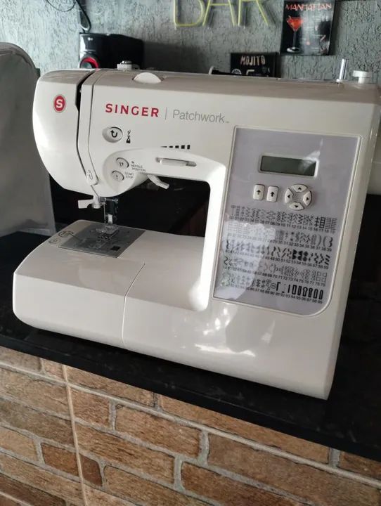 Máquina de costura singer 