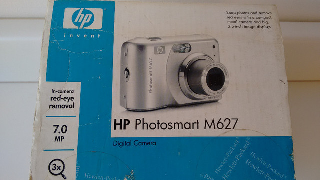 Máquina fotográfica digital, marca HP, modelo Photosmart M627. Resolução de 7,0 MP