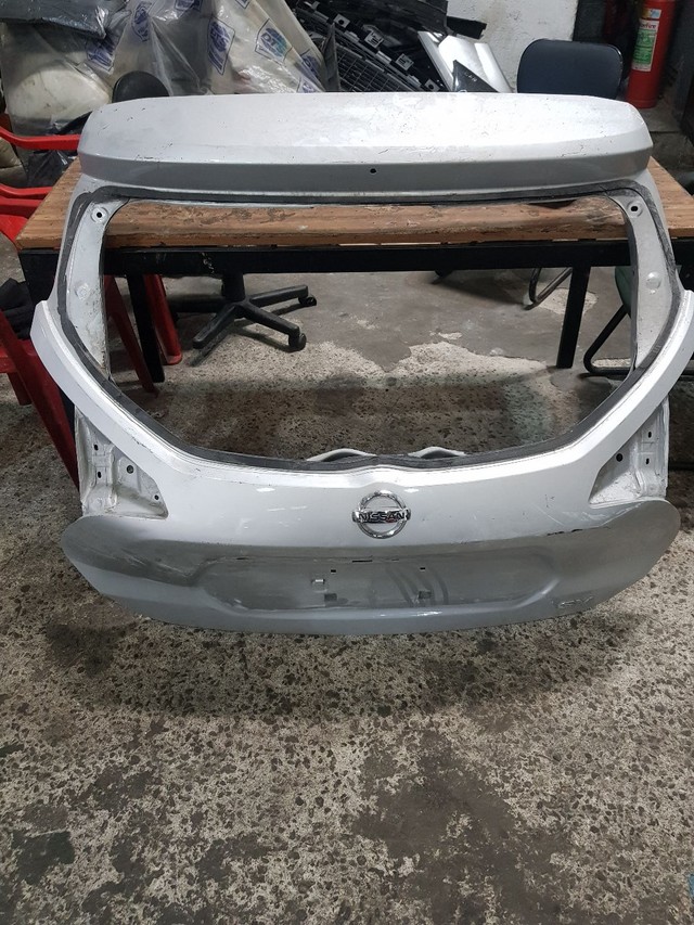 tampa de mala de nissan kicks recuperada 