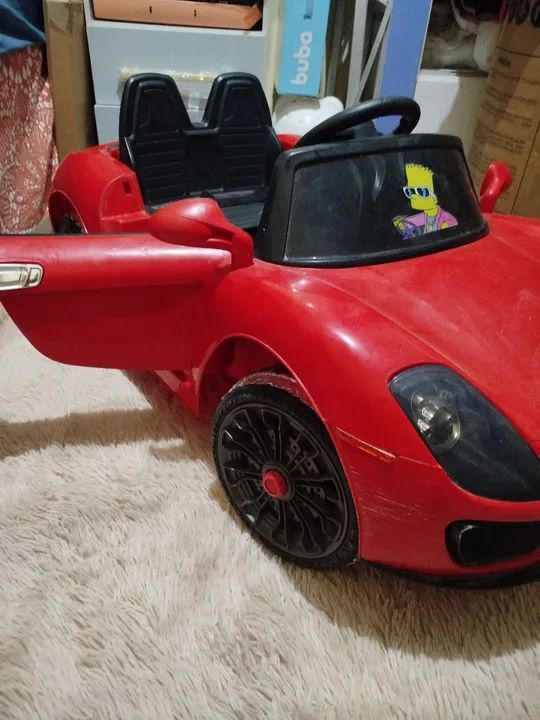 Carrinho Elétrico Infantil Vermelho com controle remoto funcionando direitinho.