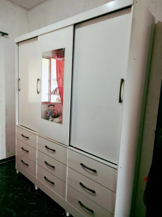 Guarda roupas 9 gavetas (peça nova) 