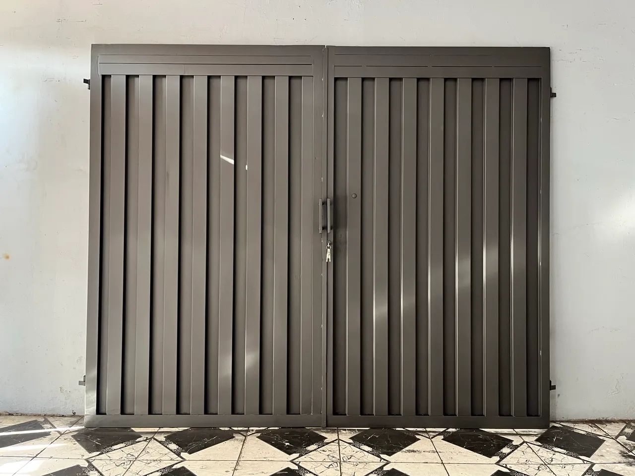 Portão de duas folhas (pivotante)64299980474498120