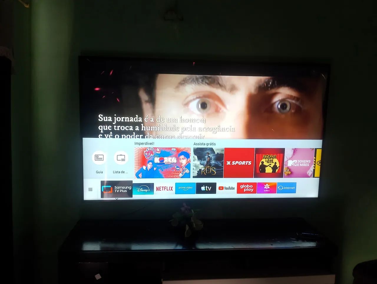 Televisão de 75 polegadas nova troco numa moto 