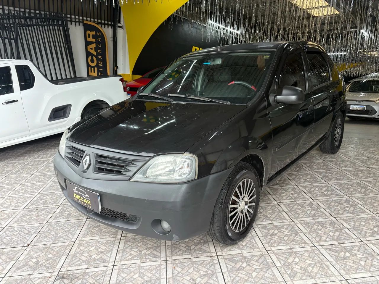 Renault Logan Authentique Hi-Flex 1.0 16V 4p, foto 3 de 9