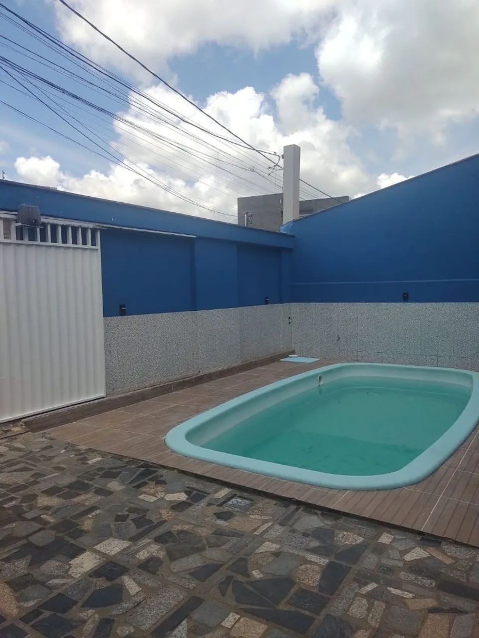 Casa com piscina no bairro Jardim Primavera