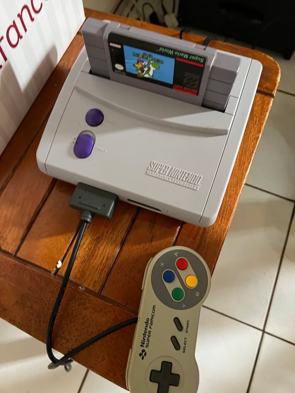 Super Nintendo com jogo Mario