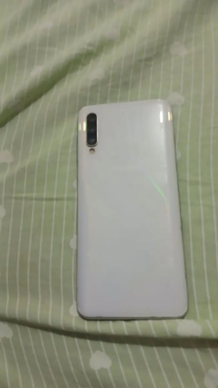 Vendo celular Samsung A50 ótimo pra uso - Foto 2