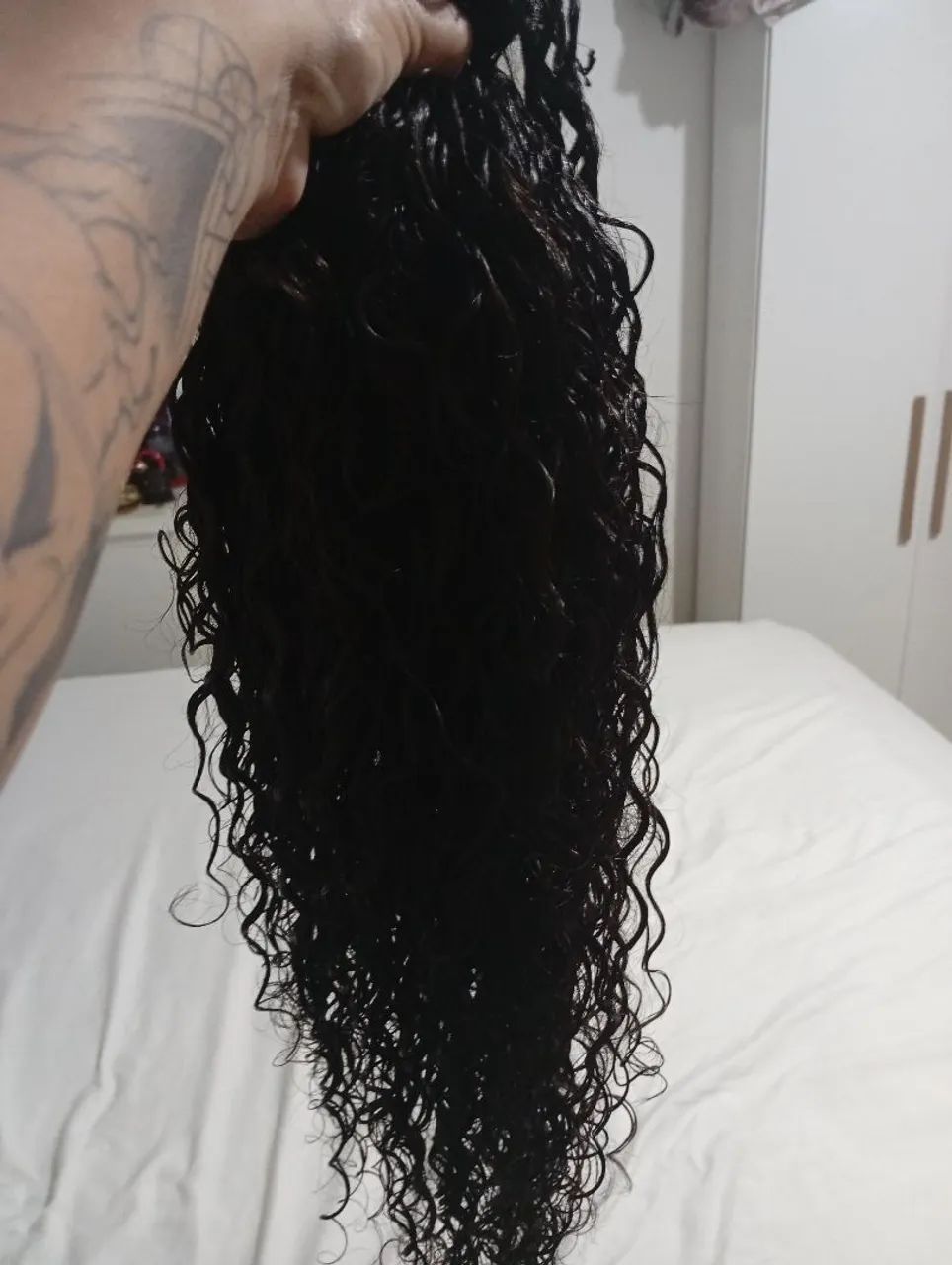 Cabelo cacheado humano