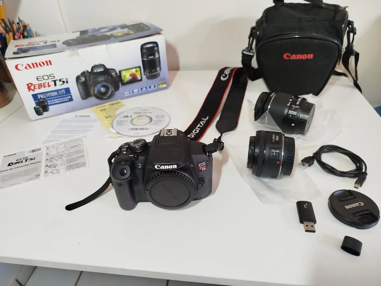 Câmera Canon EOS Rebel T5i Premium Kit - Usada - Foto 5