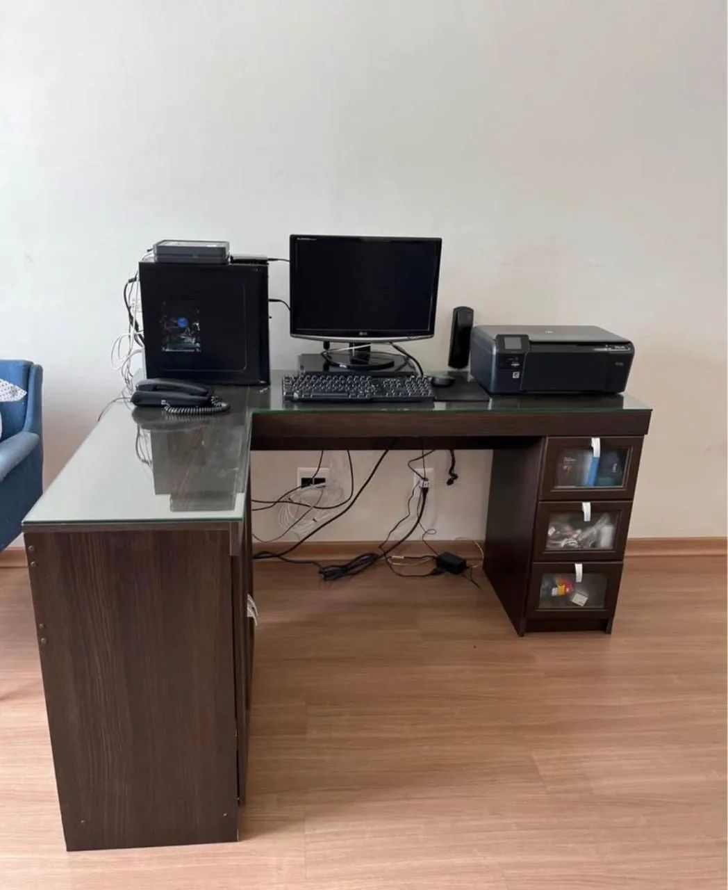 L-shaped desk with glass top