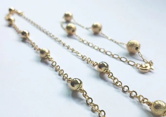 Conjunto de Colar e Pulseira de Bolinhas Banhado a Ouro 18K - Elegância e Versatilidade
