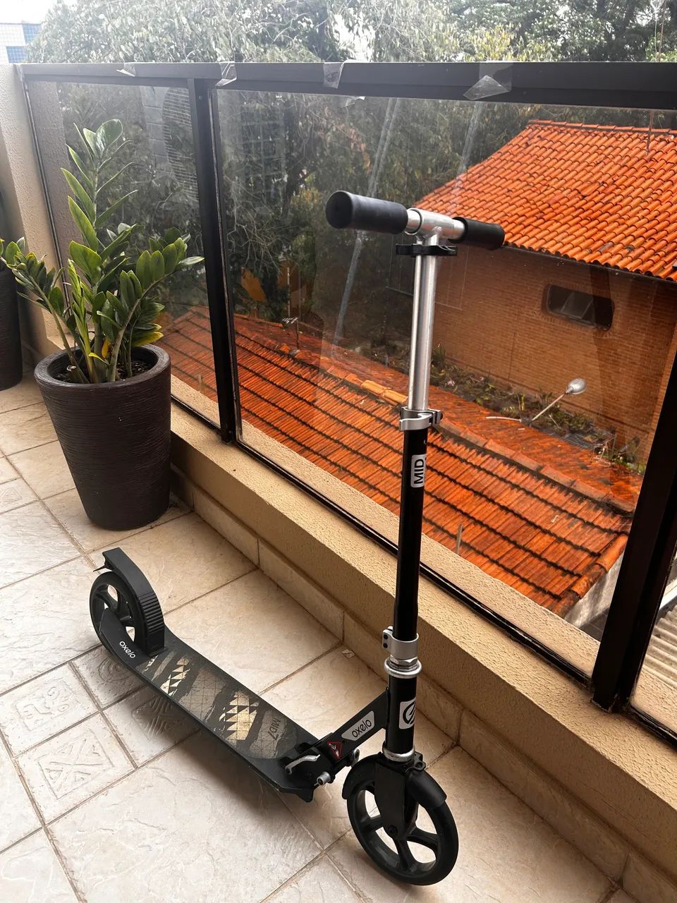 Patinete oxelo mid 7+ capacete