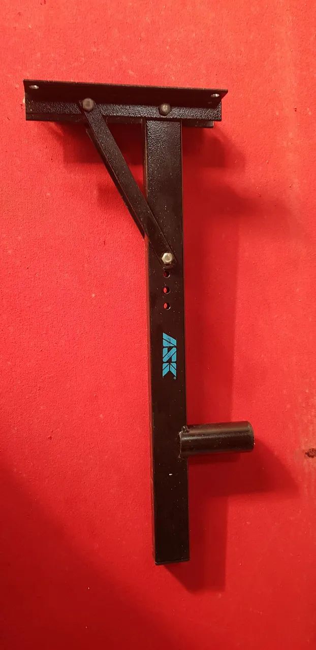 Suporte de parede para equipamento de som