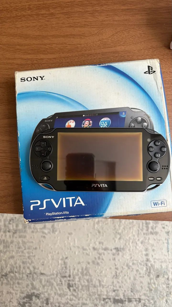 PSVita com caixa e acessórios 