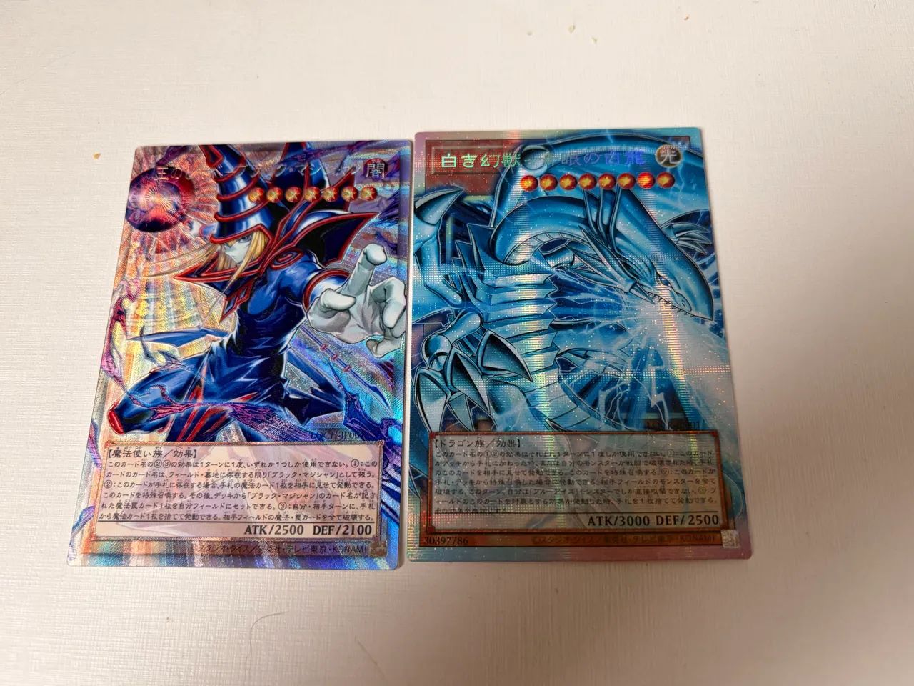 Mago negro + Dragão Branco de olhos azuis Yugioh